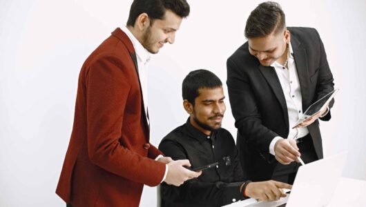 three-men-discussing-ideas-white-wall-indian-nationality