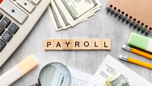 top-view-payroll-concept-with-items